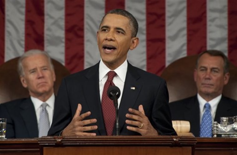 President Barack Obama delivers his State of the Union address on Capitol Hill in Washington, Tuesday, Jan. 24, 2012, as Vice President Joe Biden and House Speaker John Boehner, right, listne. (AP Photo/Saul Loeb, Pool)